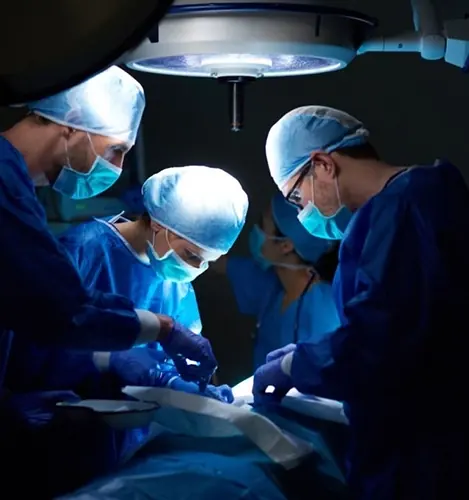 Surgical team closing a wound with Suture Planet sutures in an operating theatre